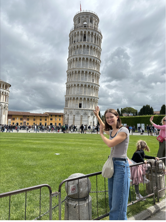 Carla pictured in front of the Leaning Tower of Pisa